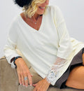 Pull V blanc dentelle