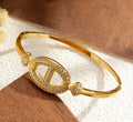 Jonc doré maille marine strass