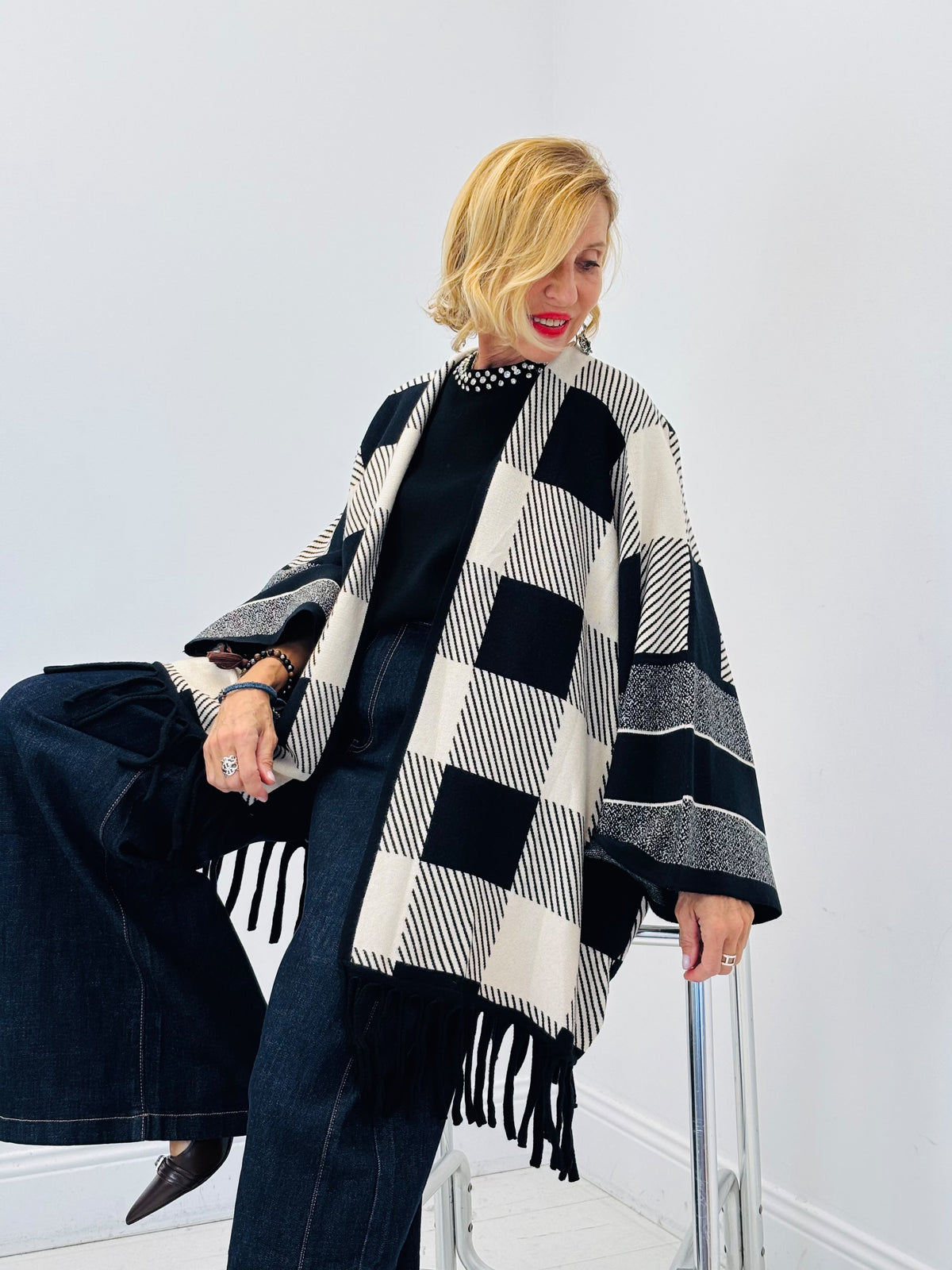 Veste chaude à franges carreaux